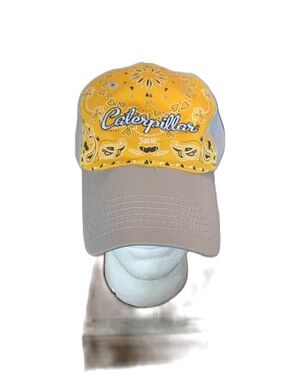 Caterpillar-branded baseball cap. yellow bandana pattern crown a solid brim. EC
